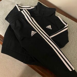 Adidas Black Sweatpants with Iconic Stripes
